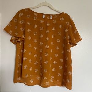 Xhiliration Yellow Floral Blouse with Flutter Sleeve and Button Clasp